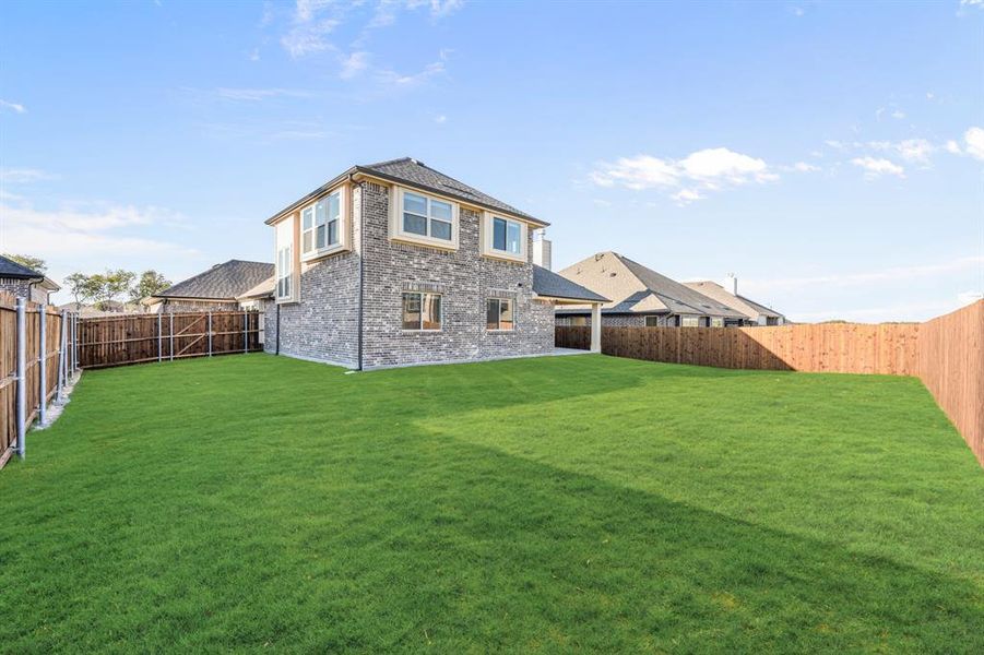 Exterior details and patio area of a home in Meadow Vista 60-65, Anna (Image 4).