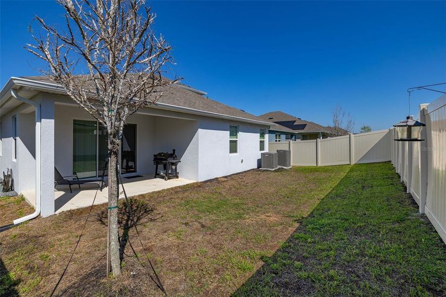 Exterior details and patio area of a home in Hartwood Landing, Clermont (Image 30).