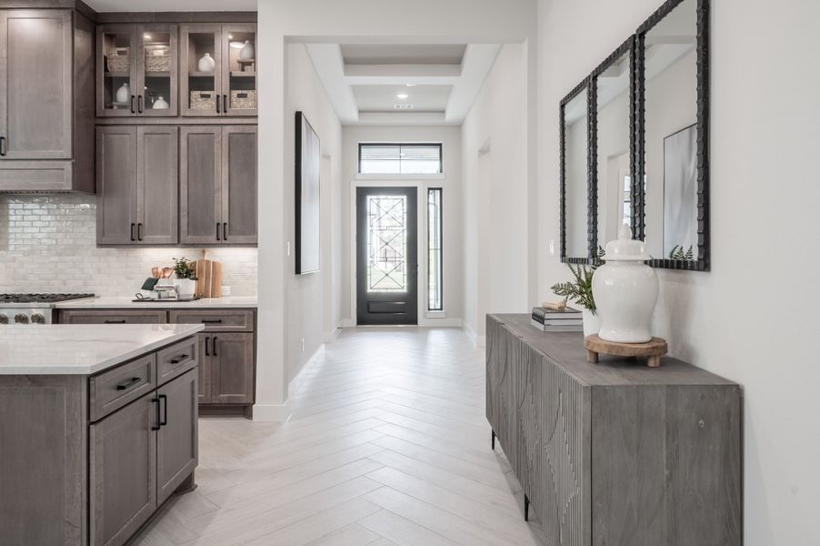 Representative furnished interior of a home built from the Carignan by Tri Pointe Homes in Sienna 80′, Missouri City (Image 6).