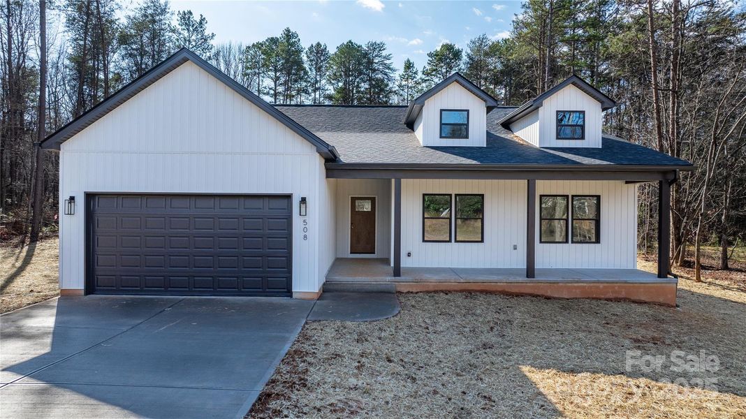 Front exterior of a new home in , Lincolnton, NC, highlighting curb appeal (Image 26).