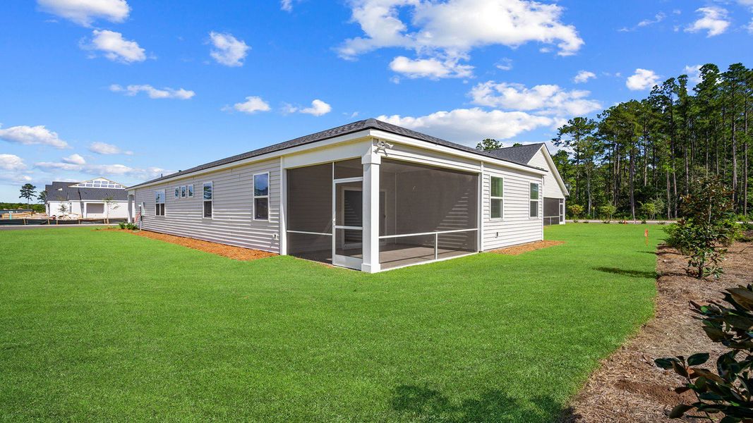 Exterior details and patio area of a home in The Lakes at North Glynn, Brunswick (Image 3).