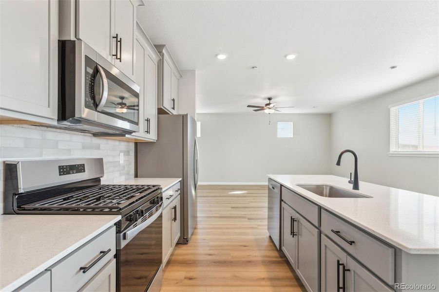 Furnished interior view inside a new home in Second Creek Farm, Commerce City (Image 8).
