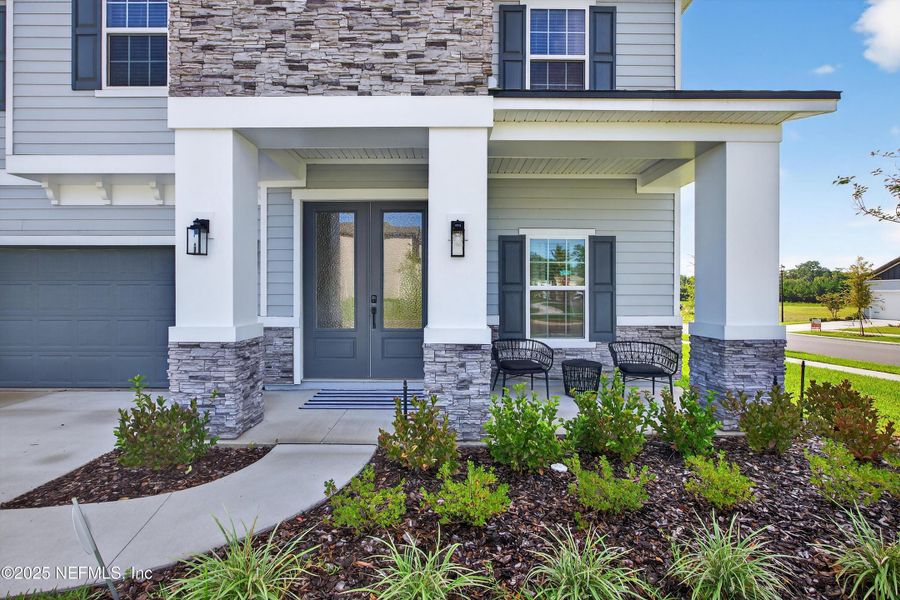 Front exterior of a new home in , Middleburg, FL, highlighting curb appeal (Image 25).