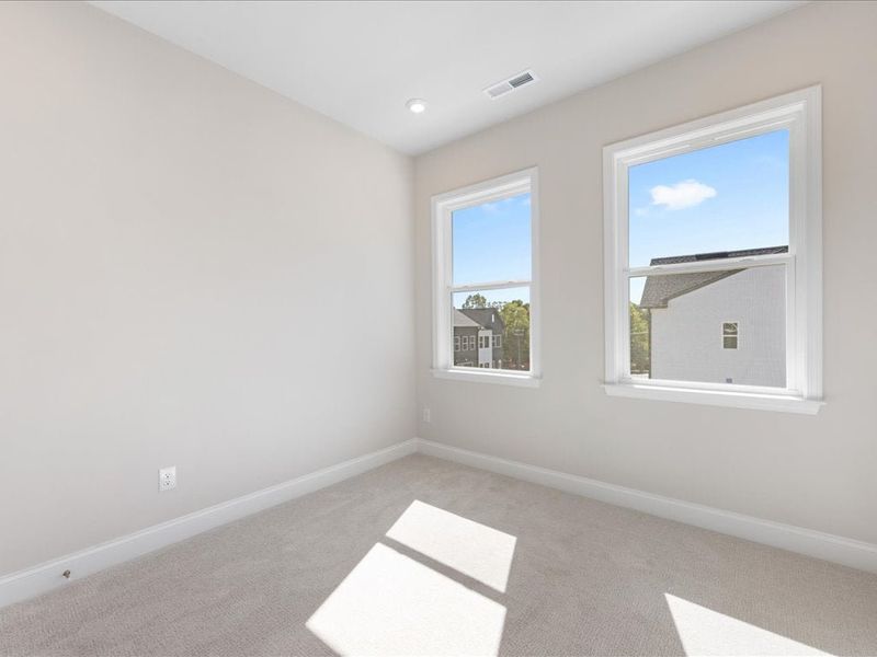 Spacious, unfurnished interior of a new home in Archer Row, Charlotte (Image 34).