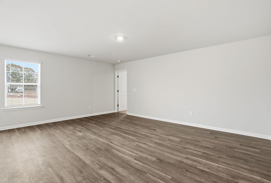 Representative unfurnished interior of a home built from the Spruce L by McGuinn Homes in Sibley Village, Sumter (Image 17).