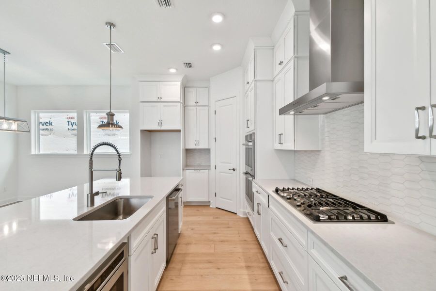 Furnished interior view inside a new home in Reflections 40' Front Load, Ponte Vedra (Image 16).