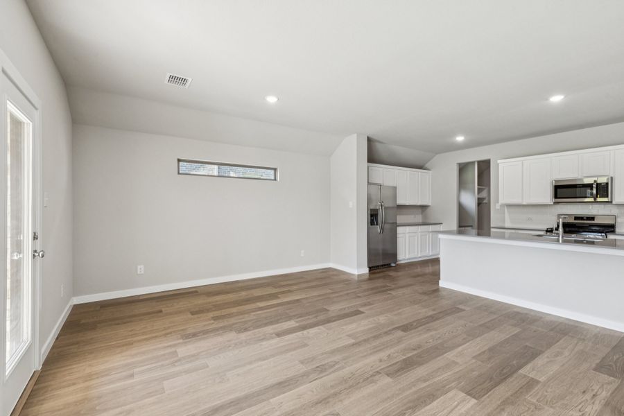 Dining Room in the Heisman home plan by Trophy Signature Homes – REPRESENTATIVE PHOTO Dining Room in the Heisman home plan by Trophy Signature Homes – REPRESENTATIVE PHOTO