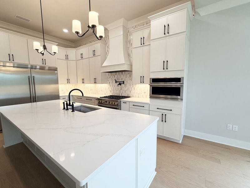 Furnished interior view inside a new home in Steamboat Landing at Hammock Bay, Freeport (Image 9).