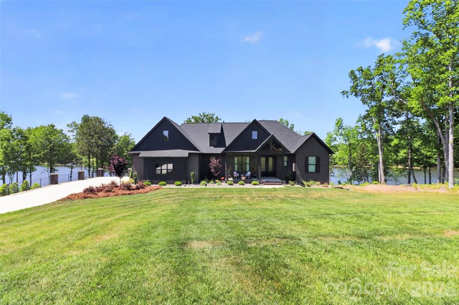 Front exterior of a new home in , Monroe, NC, highlighting curb appeal (Image 22).