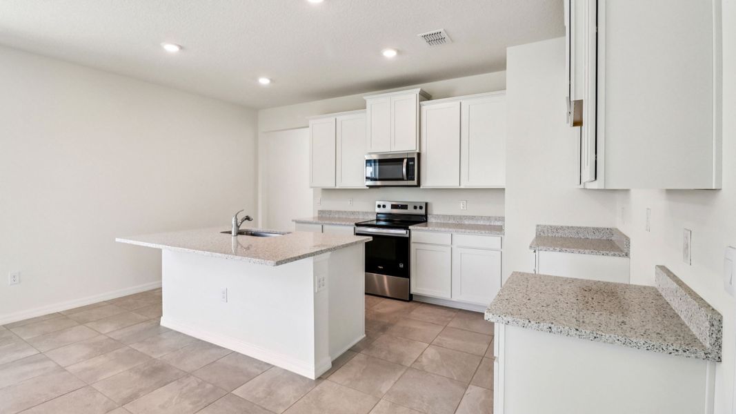 Representative furnished interior of a home built from the Jennings by D.R. Horton in Ocala Preserve, Ocala (Image 11).