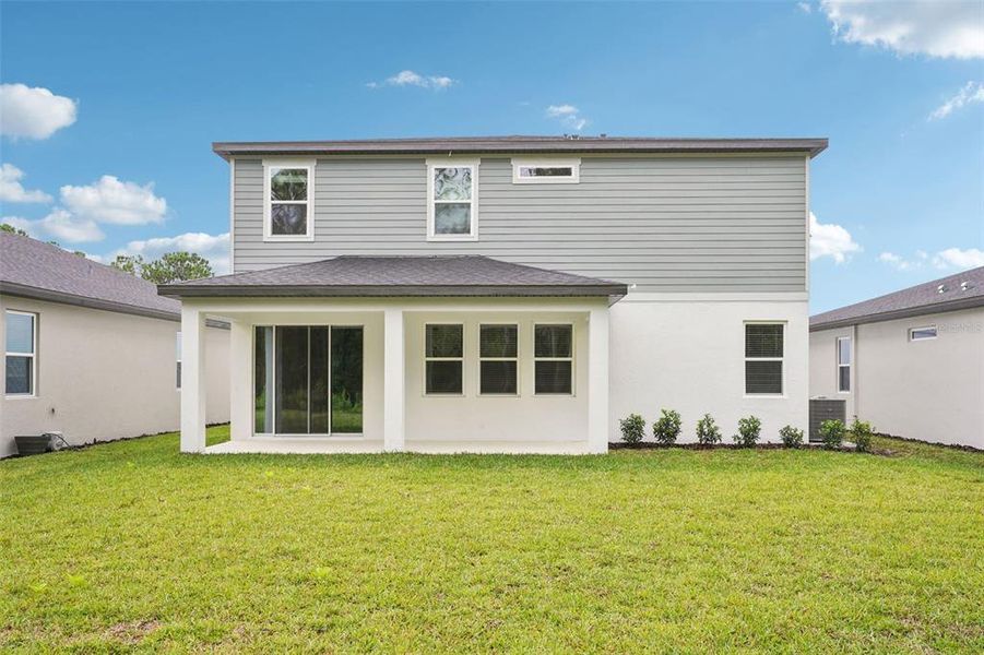 Exterior details and patio area of a home in , Ormond Beach (Image 27).