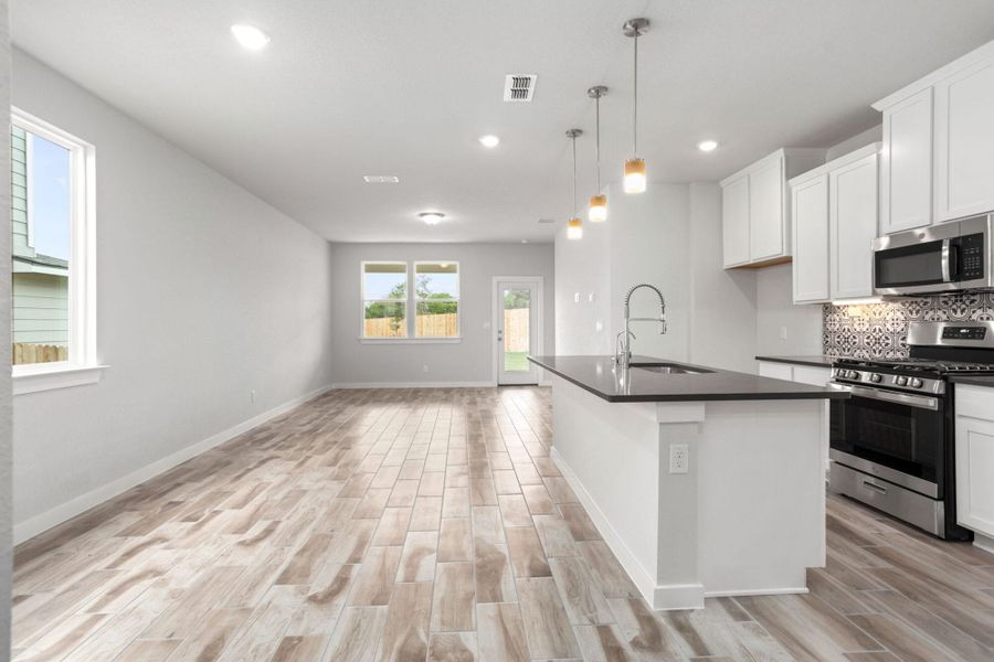 Furnished interior view inside a new home in Weston Oaks, San Antonio (Image 5).