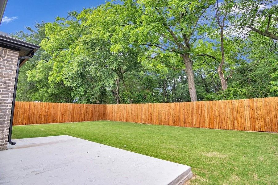 View of yard featuring a patio View of yard featuring a patio