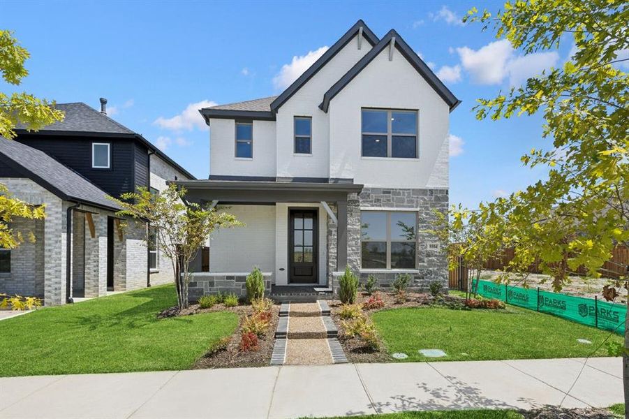 Front exterior of a new home in Talia – Cottage Series, Mesquite, TX, highlighting curb appeal (Image 1). Front exterior of a new home in Talia – Cottage Series, Mesquite, TX, highlighting curb appeal (Image 1).