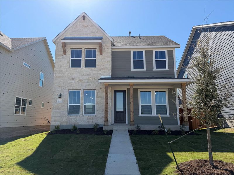 Front exterior of a new home in Lariat, Liberty Hill, TX, highlighting curb appeal (Image 2). Front exterior of a new home in Lariat, Liberty Hill, TX, highlighting curb appeal (Image 2).