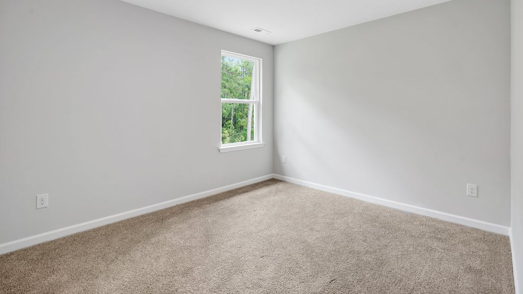 Spacious, unfurnished interior of a new home in Saltgrass Landing, Winnabow (Image 30).