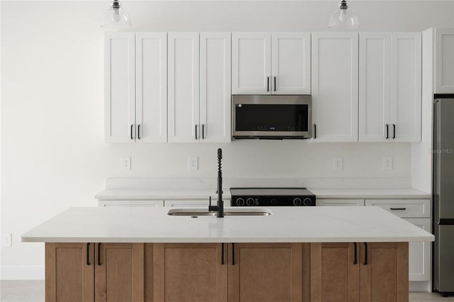 Furnished interior view inside a new home in , Orange City (Image 17).