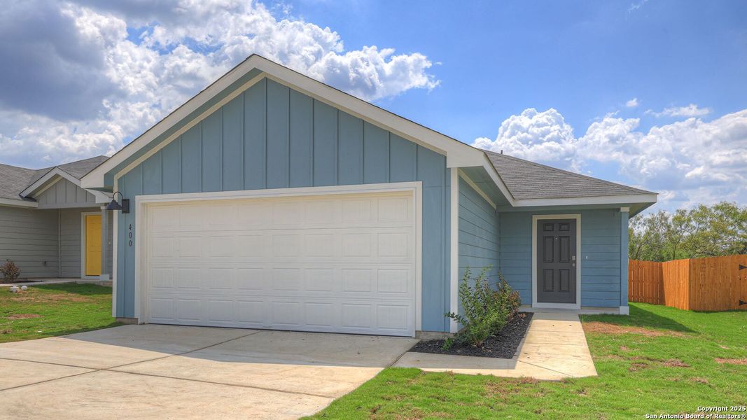 Front exterior of a new home in Ladera, Luling, TX, highlighting curb appeal (Image 19). Front exterior of a new home in Ladera, Luling, TX, highlighting curb appeal (Image 19).