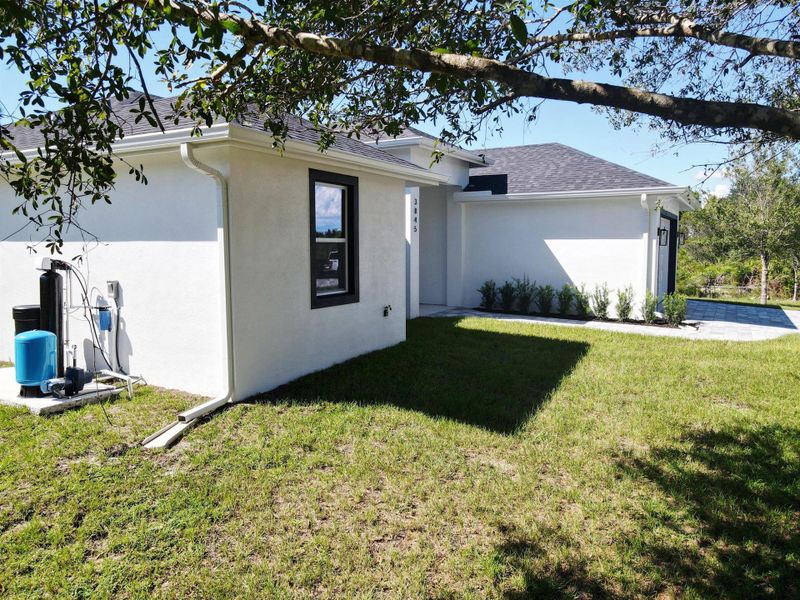 Front exterior of a new home in , Okeechobee, FL, highlighting curb appeal (Image 2).