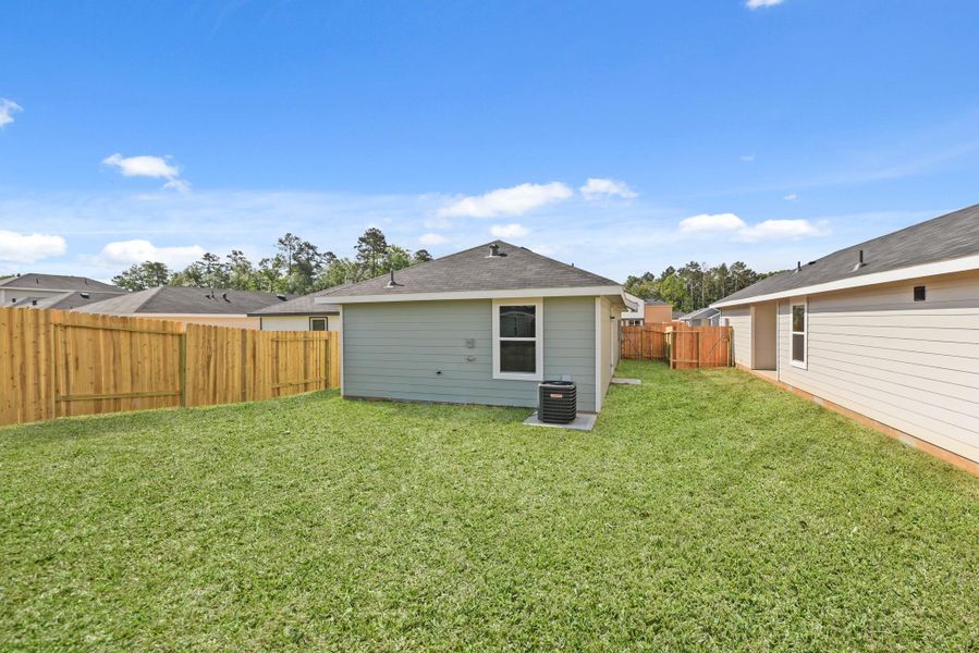 Exterior details and patio area of a home in William Trails, Willis (Image 3).