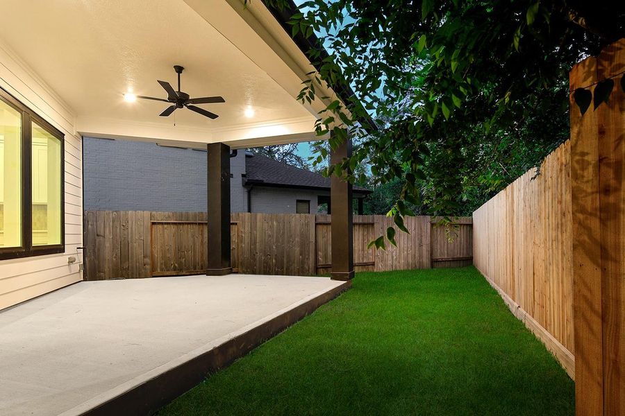 Exterior details and patio area of a home in , The Woodlands (Image 21). Exterior details and patio area of a home in , The Woodlands (Image 21).