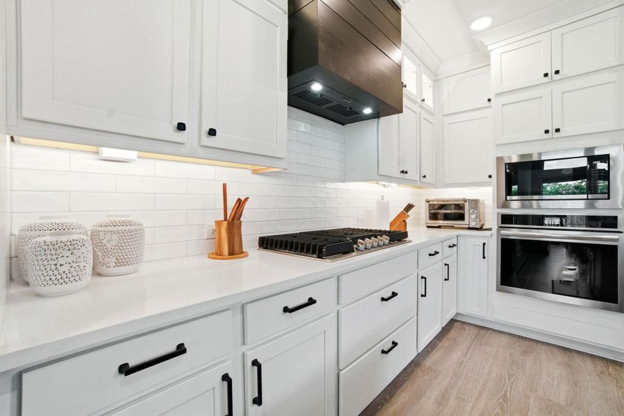 Furnished interior view inside a new home in Woodforest - Kingsley Square 50' Homesites, Montgomery (Image 10).