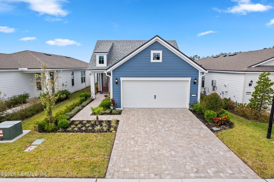Front exterior of a new home in , Yulee, FL, highlighting curb appeal (Image 23). Front exterior of a new home in , Yulee, FL, highlighting curb appeal (Image 23).