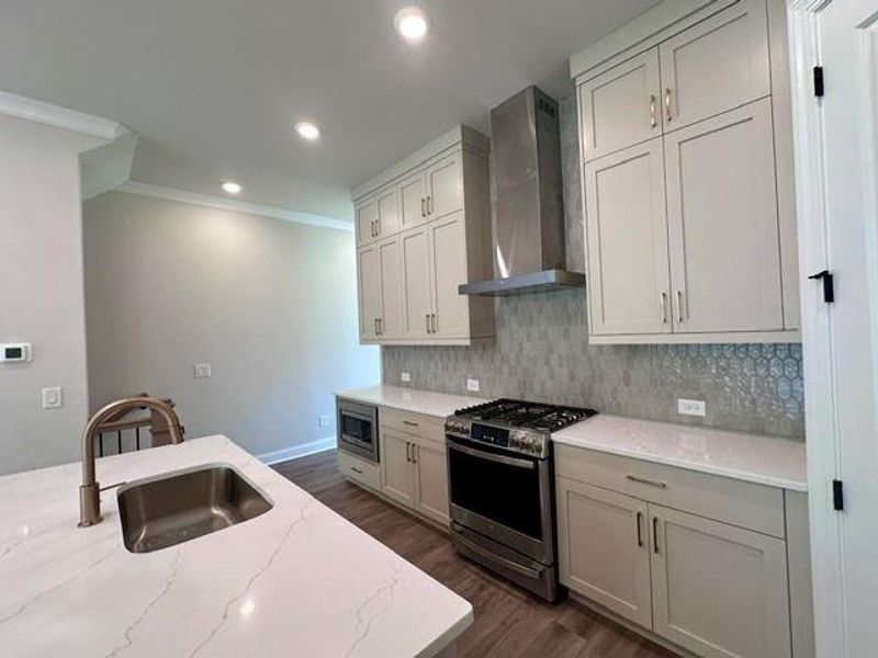 Furnished interior view inside a new home in Ward's Crossing Townhomes, Johns Creek (Image 12).