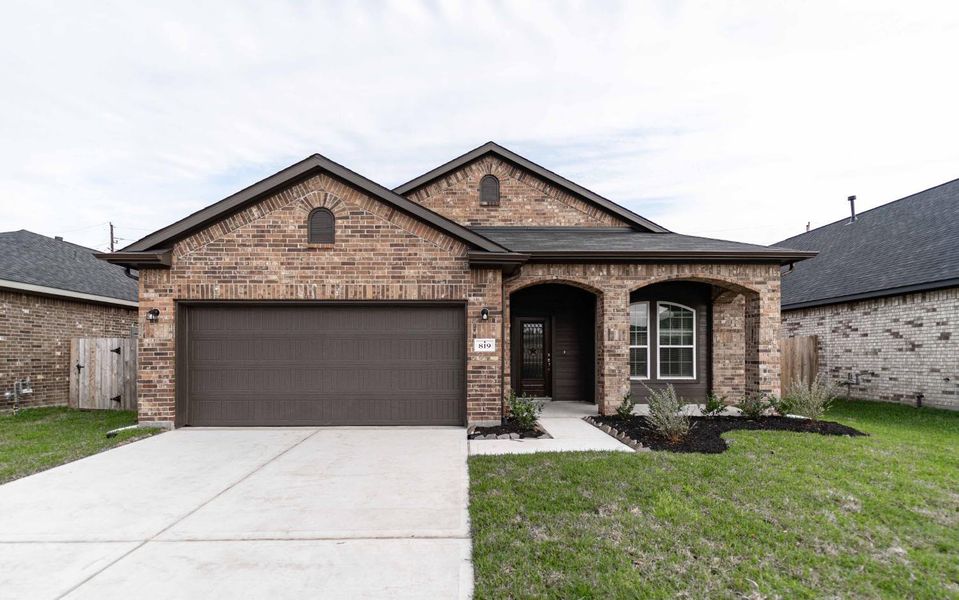 Front exterior of a new home in Pecan Estates, Crosby, TX, highlighting curb appeal (Image 1). Front exterior of a new home in Pecan Estates, Crosby, TX, highlighting curb appeal (Image 1).