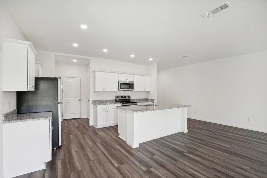 Representative furnished interior of a home built from the Orbit by Starlight Homes in Coyote Meadows, Anna (Image 12).
