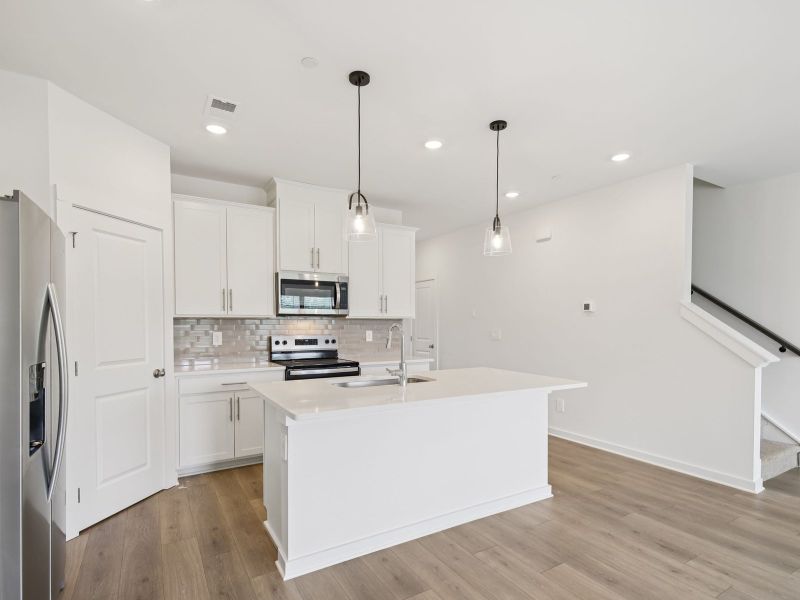 Furnished interior view inside a new home in Cedarcrest Townhomes, Fairview (Image 3).