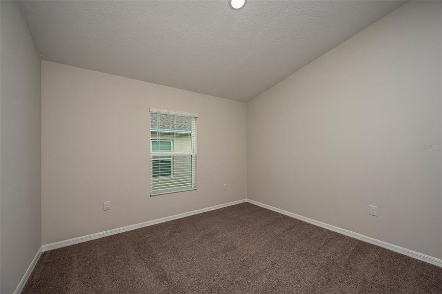 Spacious, unfurnished interior of a new home in Scenic Terrace, Haines City (Image 27).