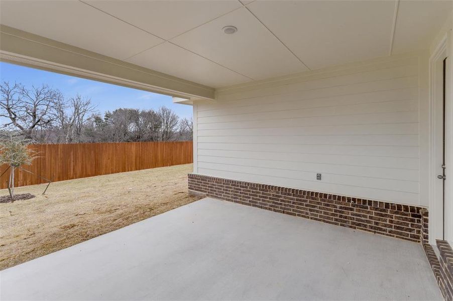 Exterior details and patio area of a home in Covenant Park, Springtown (Image 19).