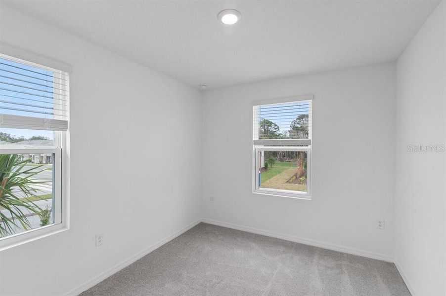 Spacious, unfurnished interior of a new home in Waterstone Townhomes, Groveland (Image 25).