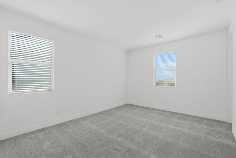 Spacious, unfurnished interior of a new home in Artisan at Asante, Surprise (Image 30).