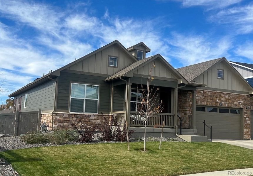 Front exterior of a new home in Vantage, Berthoud, CO, highlighting curb appeal (Image 1). Front exterior of a new home in Vantage, Berthoud, CO, highlighting curb appeal (Image 1).
