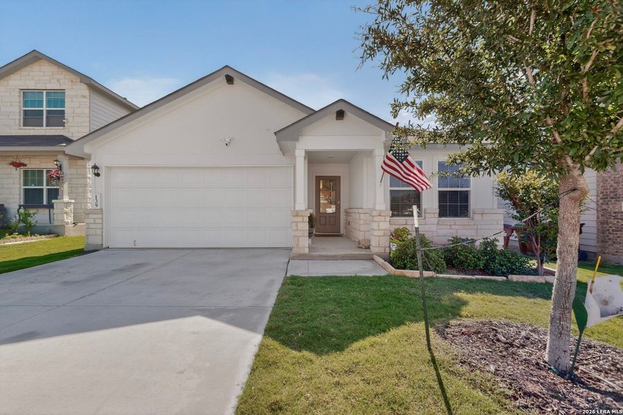 Front exterior of a new home in Redbird Ranch, San Antonio, TX, highlighting curb appeal (Image 24). Front exterior of a new home in Redbird Ranch, San Antonio, TX, highlighting curb appeal (Image 24).