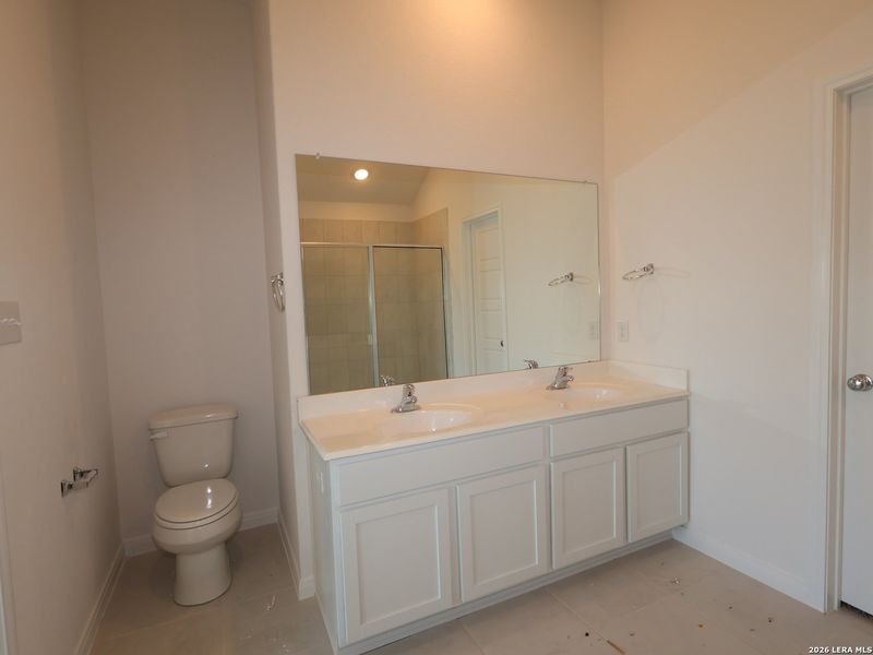 Furnished interior view inside a new home in Hunters Ranch, San Antonio (Image 14).