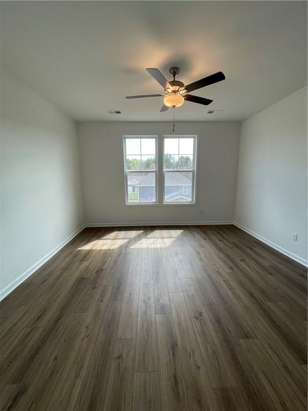 This bright room features durable flooring and a r