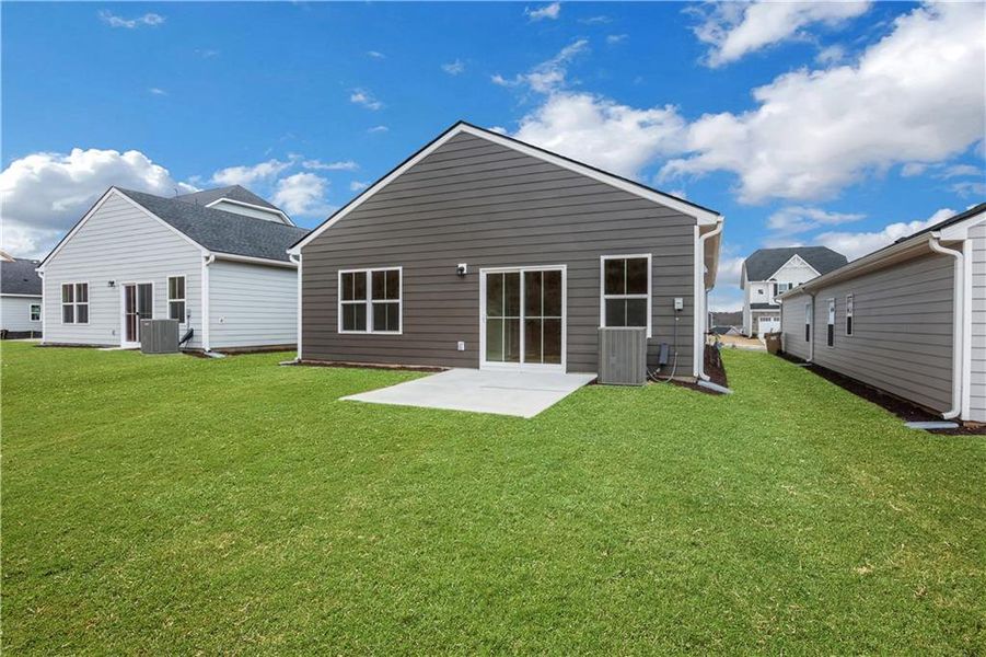 Front exterior of a new home in , Hoschton, GA, highlighting curb appeal (Image 1).