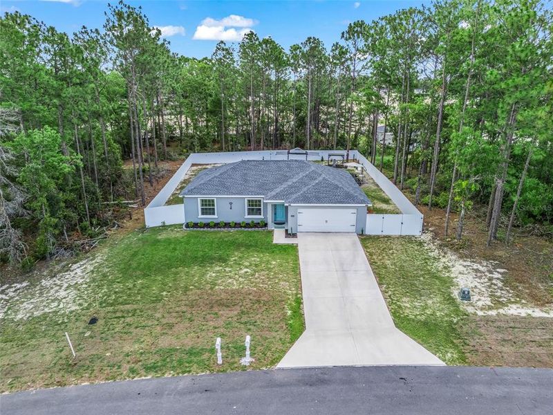 Front exterior of a new home in , Ocala, FL, highlighting curb appeal (Image 23).