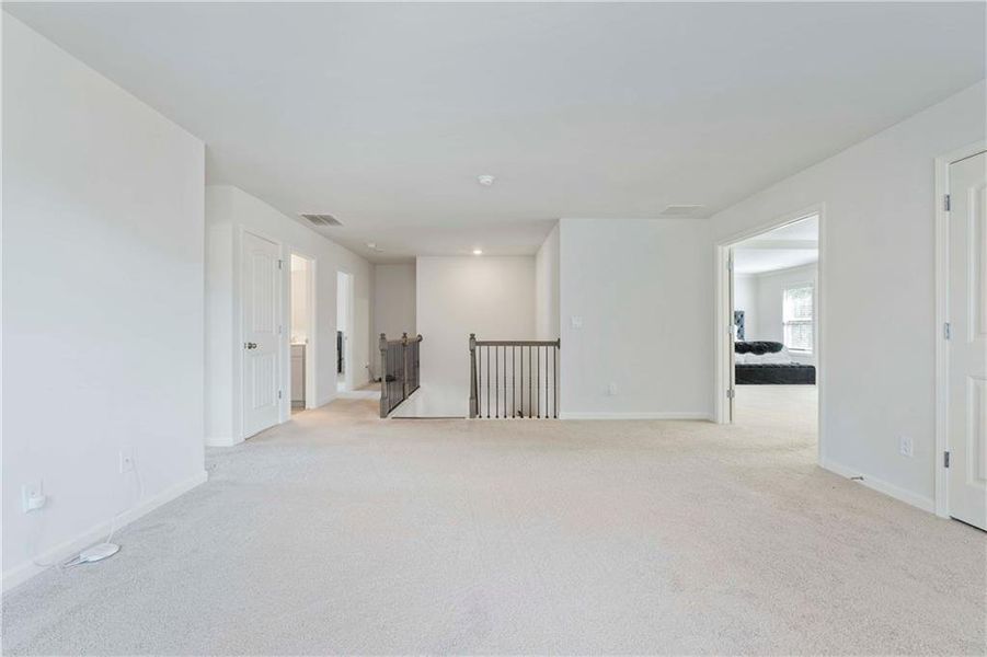 Spacious, unfurnished interior of a new home in Tributary Village, Douglasville (Image 23).