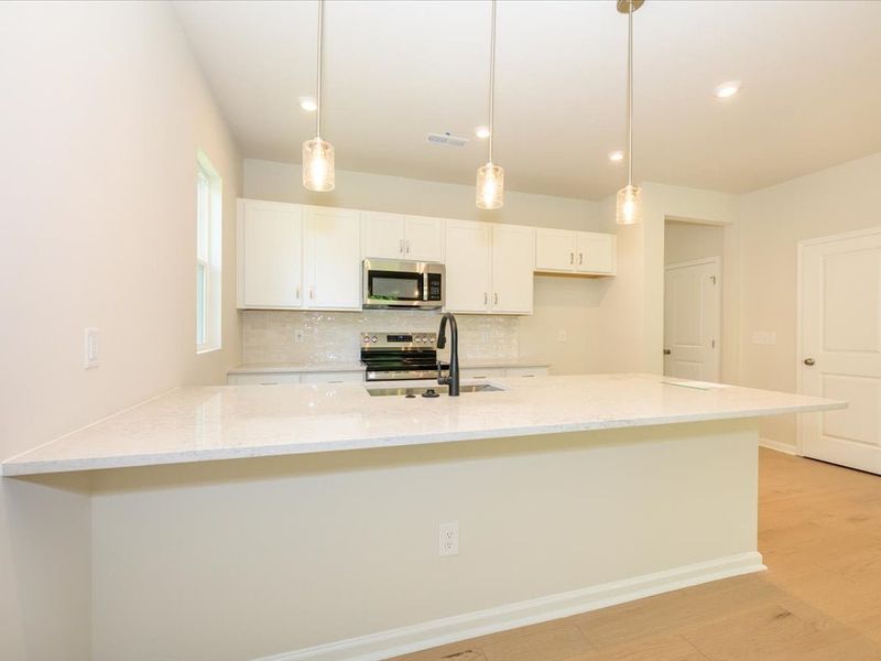 Furnished interior view inside a new home in Fifteen 15 Cannon, Charlotte (Image 6).
