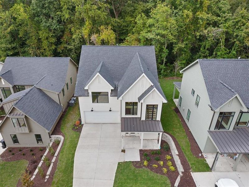 Front exterior of a new home in , Atlanta, GA, highlighting curb appeal (Image 30).
