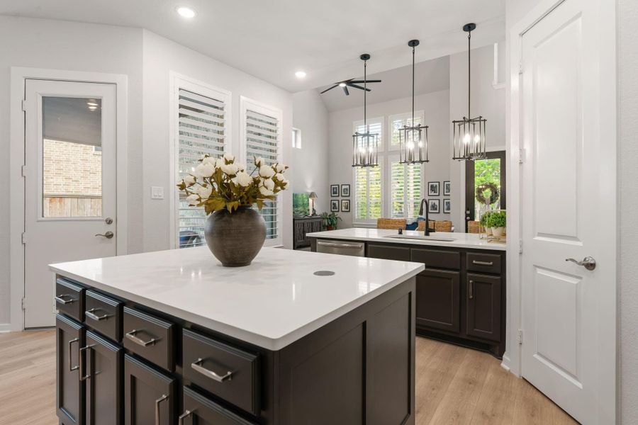 View from the kitchen area - plenty of room for families and friends - door leads to covered patio and expansive side yard.