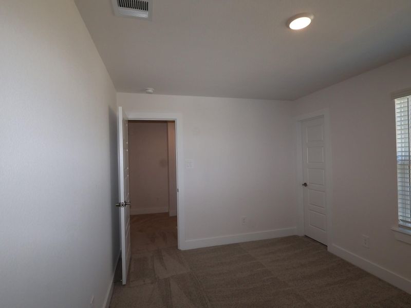 Spacious, unfurnished interior of a new home in Sorella, Tomball (Image 20).