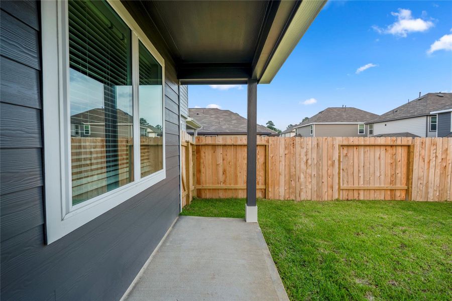 Exterior details and patio area of a home in , Conroe (Image 26). Exterior details and patio area of a home in , Conroe (Image 26).