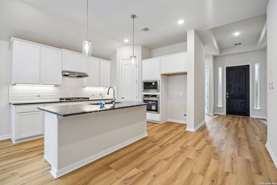Furnished interior view inside a new home in The Crossvine, Schertz (Image 9).