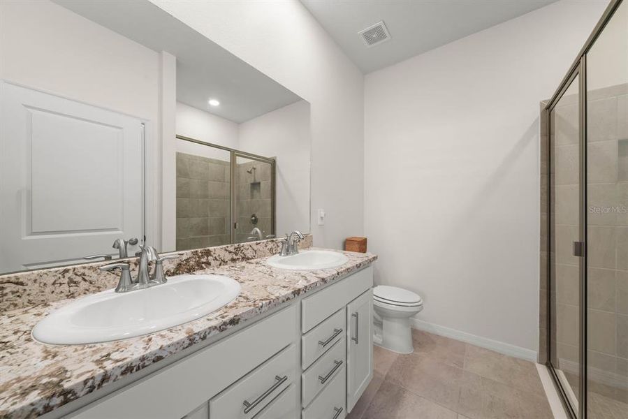 Furnished interior view inside a new home in Star Farms at Lakewood Ranch, Bradenton (Image 23).