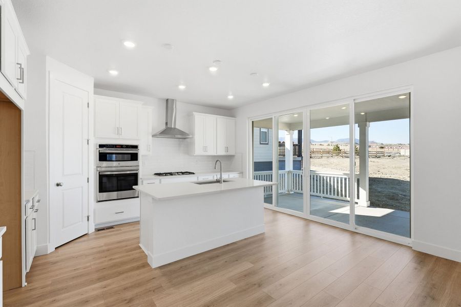 Furnished interior view inside a new home in Trailstone, Arvada (Image 3).